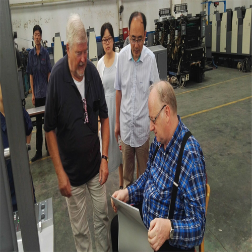 UPG accompany with customers to do the inspection of printing machine
